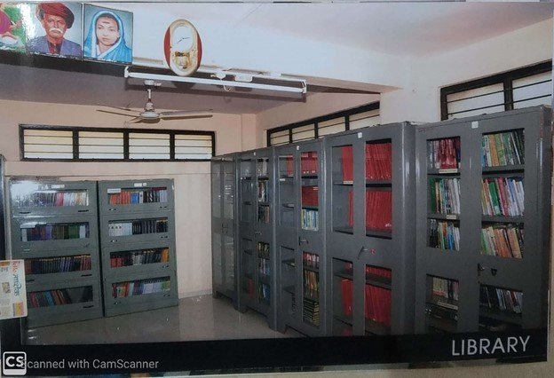 Students studying in the main reading hall with natural lighting